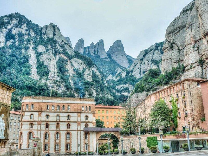 Montserrat abbey with the serrated peaks of the massif behind it