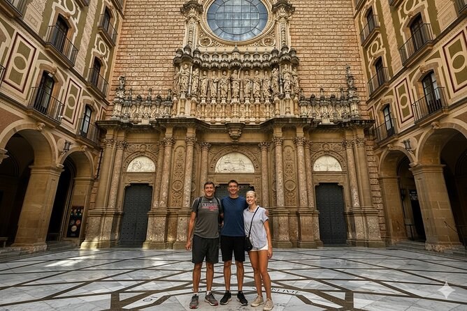 The atrium in front of the basilica at Montserrat, its arches opening off the square